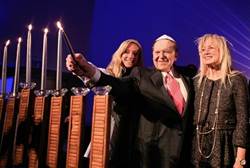 Adelsons Light Hanukkah Candles with Taglit Participants